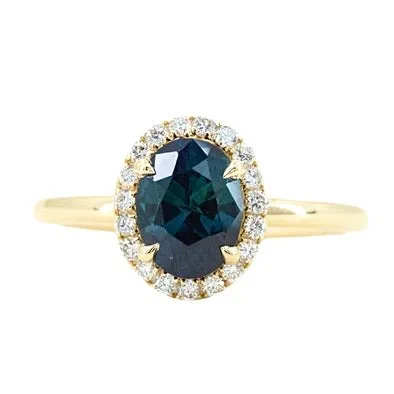 1.55ct Oval Blue Nigerian Sapphire and Diamond Four Prong Halo Ring in 14k Yellow Gold