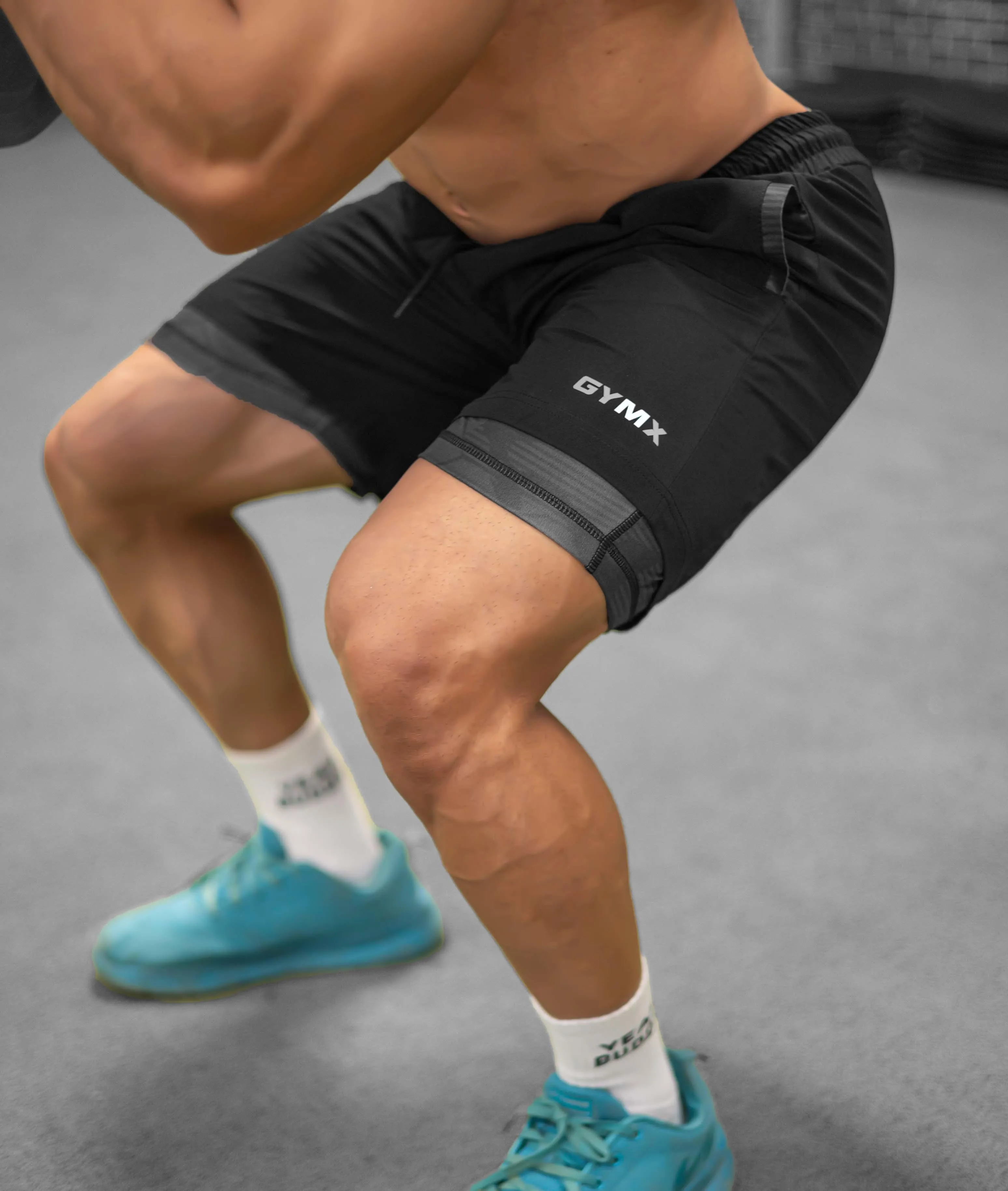 2-in-1 Compression Shorts with phone pocket: Black Camo