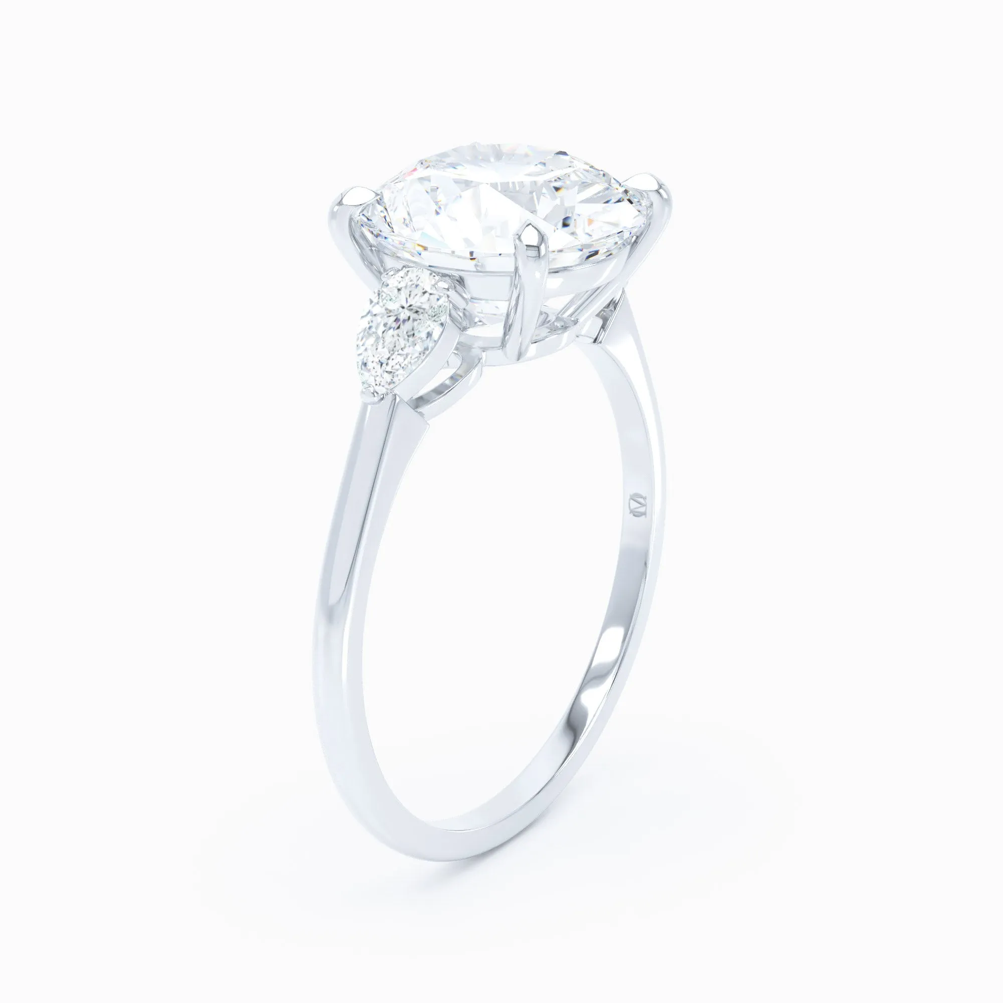 3 Stone - Pear Shape Sides - Round Engagement Ring